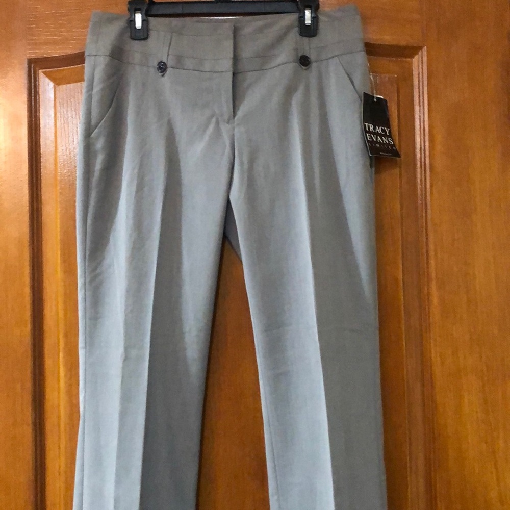New with tags. Polyester/rayon/spandex; washable.